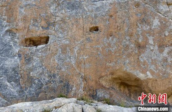 圖為動物巖畫。(資料圖) 呼和巴爾斯 攝